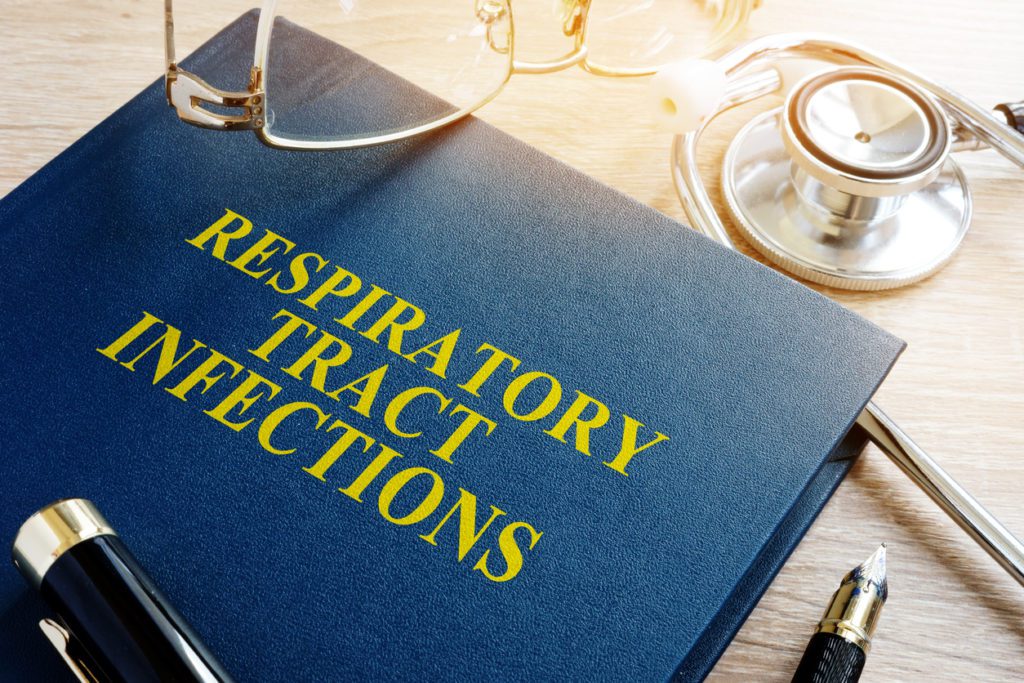 A book with the words, "respiratory tract infections" on it.