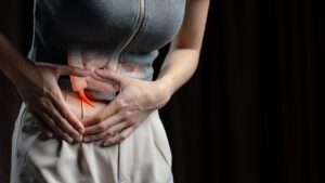 A woman experiencing Appendicitis pain