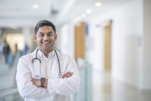 primary care doctor smiling in photo