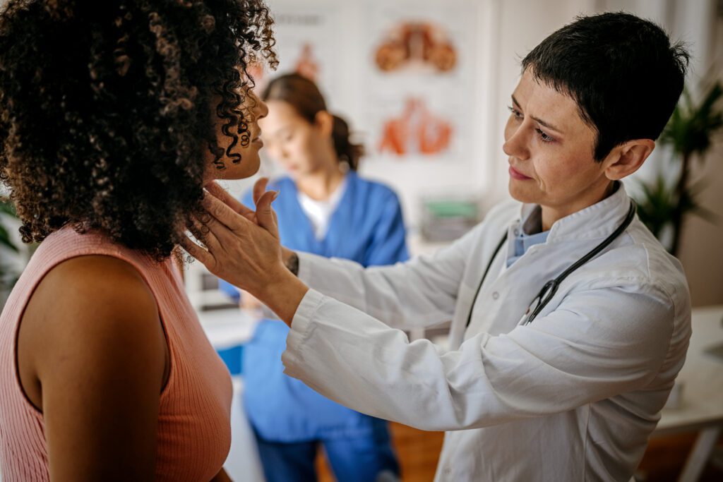 patient being seen by their primary care doctor for a physical