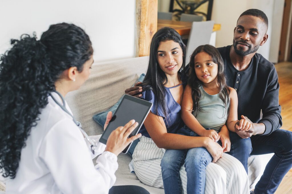 Young family getting medical consultation from primary care doctor