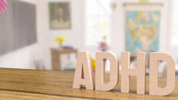 The adhd wood text on table in class room for medical or education concept 3d rendering