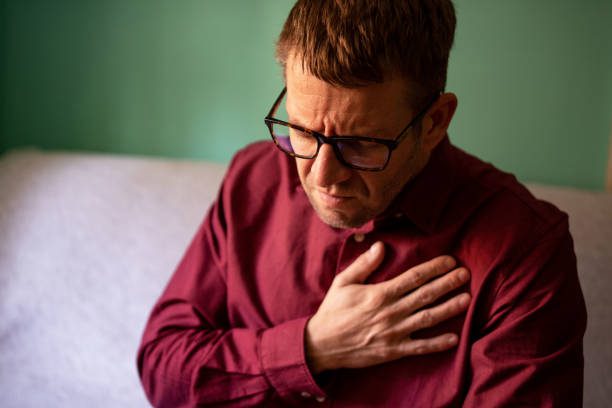 Man with chest pain suffering from heart attack